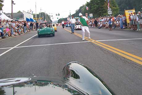 The green flag waves at the Grand Prix race reenactment