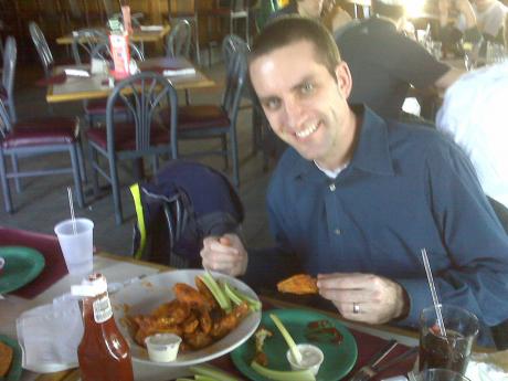 Kris eating wings at Buffalo Sports Garden