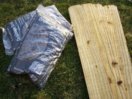Boards and stones for deck skirt