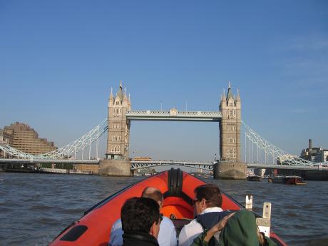 Speedboat beneath Tower Bridge