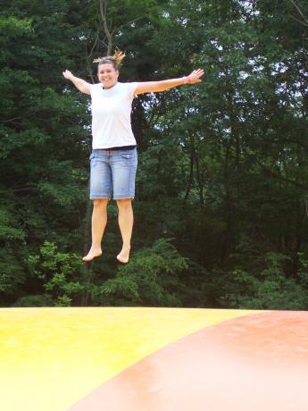 Tricia gets airborne on the Jumping Pillow